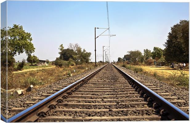 Indian Railroad track with overhead cables Canvas Print by Arfabita  
