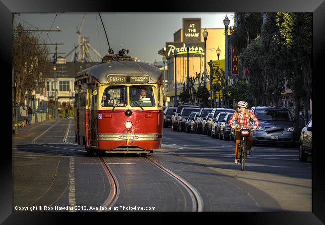 Street Car v Bike Framed Print by Rob Hawkins