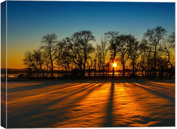 Sunset on snow Kinross Canvas Print by Adrian Maricic