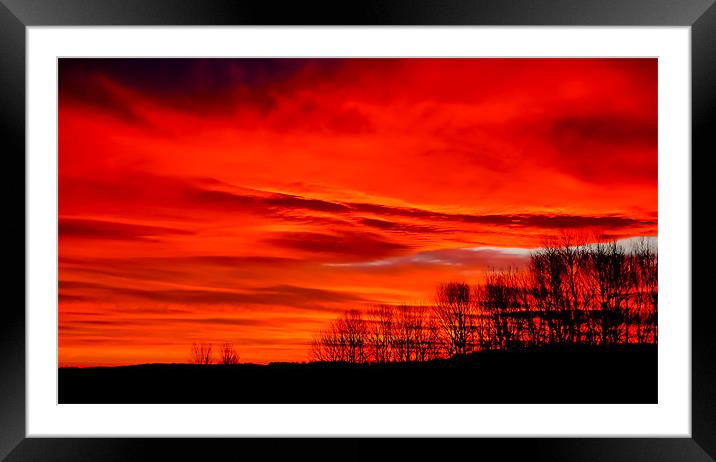 A vivid red Sunrise. Framed Mounted Print by Adrian Maricic
