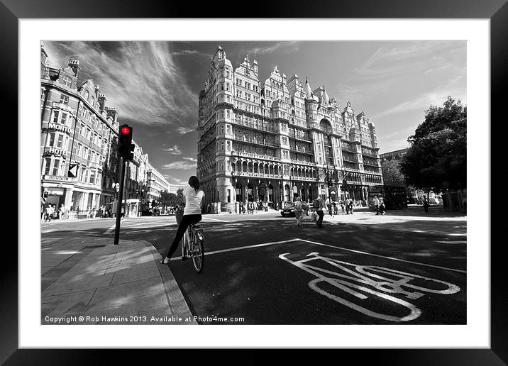 Cycling in the city Framed Mounted Print by Rob Hawkins