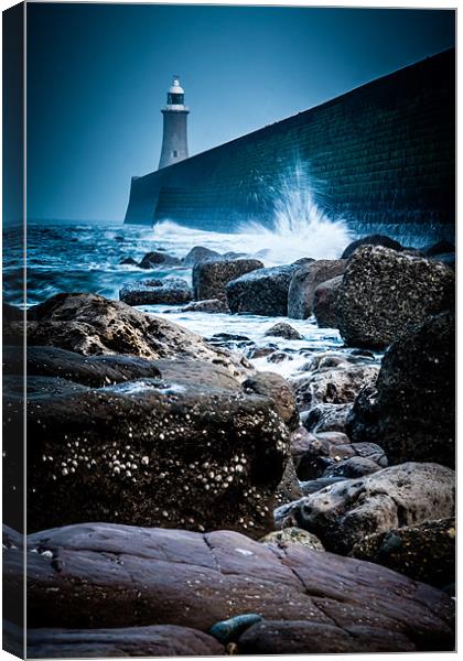 Waves at Tynemouth Lighthouse Canvas Print by John Shahabeddin