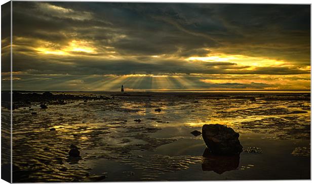 Rays, Rocks and a Lighthouse Canvas Print by Aran Smithson