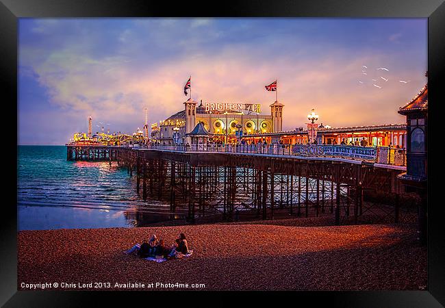 Brighton Pier at Dusk Framed Print by Chris Lord