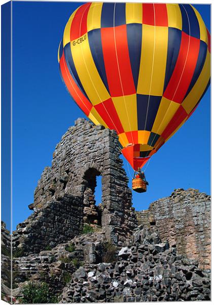 Balloon over Caldicot Castle Canvas Print by Peter Cope