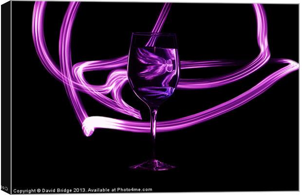 Glass with Purple Swirl Canvas Print by David Bridge