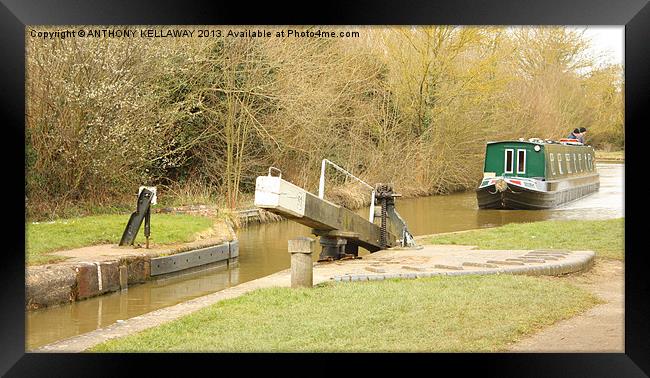 APPROACHING THE LOCK Framed Print by Anthony Kellaway
