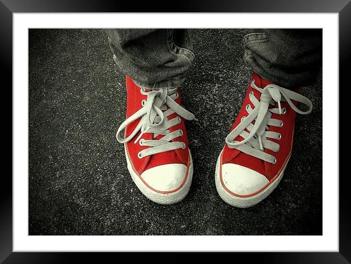 red sneakers Framed Mounted Print by Heather Newton