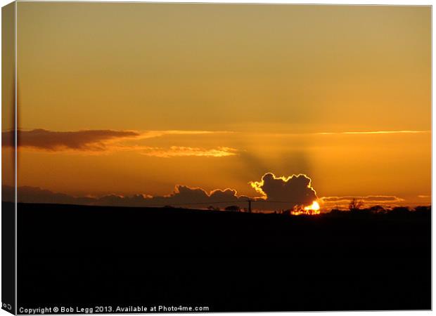 Sunset and cloud formation Canvas Print by Bob Legg