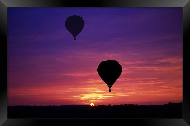 Balloons at Sunset Framed Print by Peter Cope