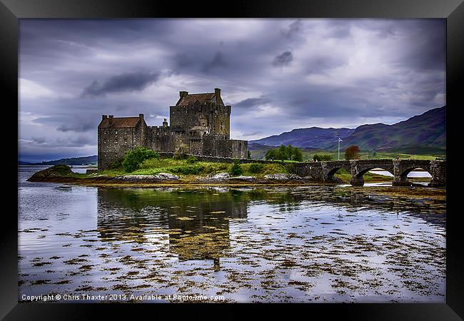 Majestic Eilean Donan Castle A Picturesque Highlan Framed Print by Chris Thaxter