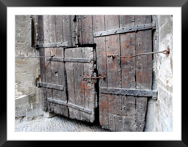 Weathered wooden doors Framed Mounted Print by Regis Yaworski