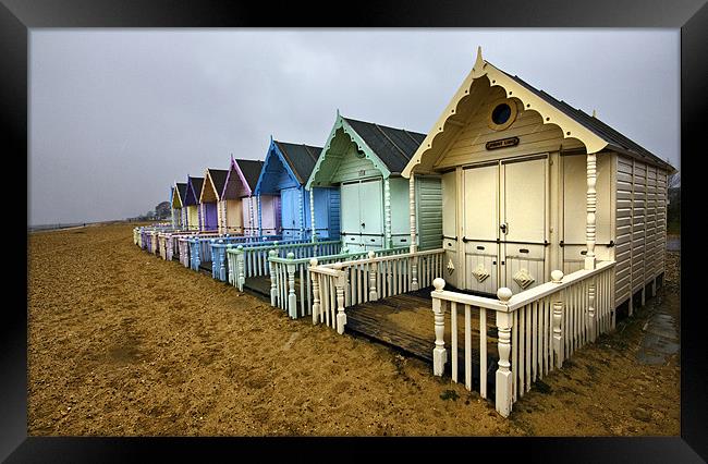 Winter Beach Huts Framed Print by Darren Burroughs