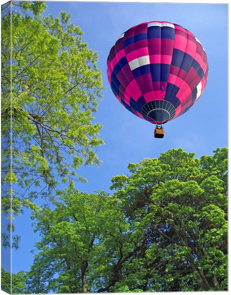 Balloon in flight Canvas Print by Peter Cope