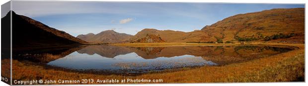 Reflections in a Highland Loch. Canvas Print by John Cameron