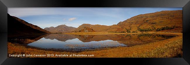 Reflections in a Highland Loch. Framed Print by John Cameron