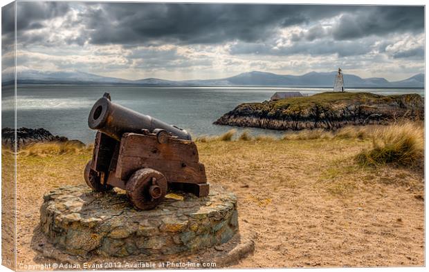 Cannon at Llanddwyn Island Canvas Print by Adrian Evans