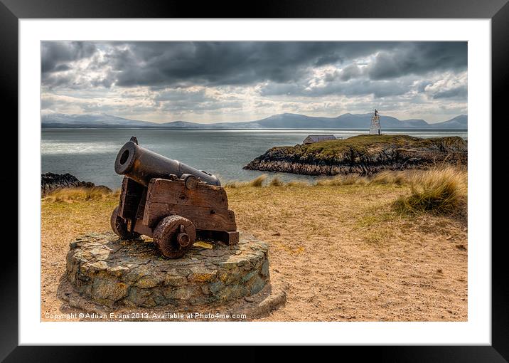 Cannon at Llanddwyn Island Framed Mounted Print by Adrian Evans