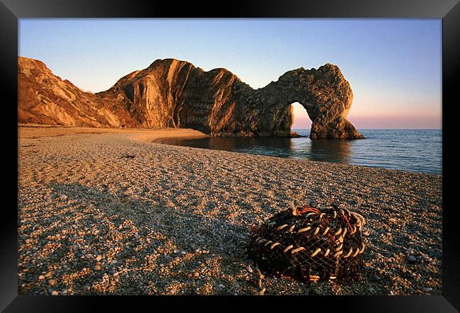 Durdle Door at dusk. Framed Print by Ian Duffield