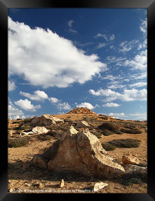 Rocks and Sky Framed Print by Dave Menzies