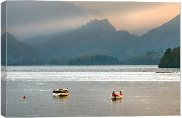 Caught in the light on Derwentwater. Canvas Print by Ian Duffield