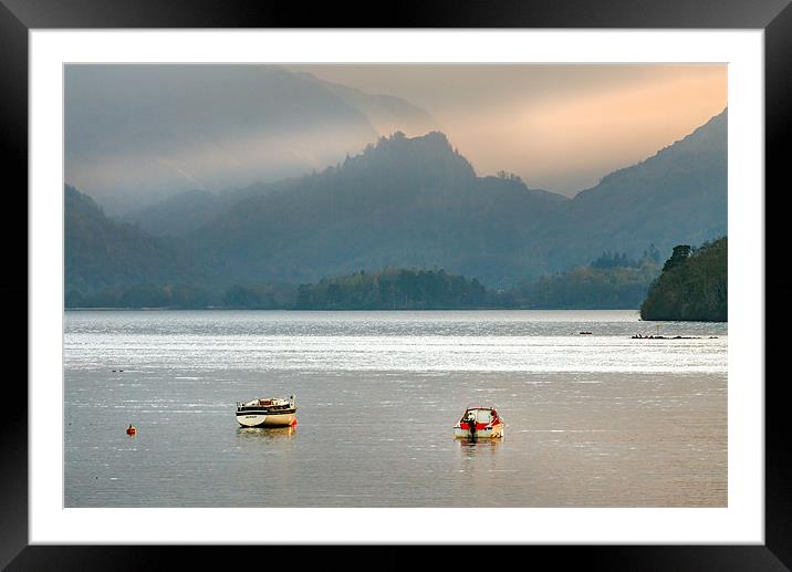 Caught in the light on Derwentwater. Framed Mounted Print by Ian Duffield