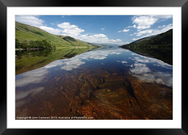 Still clear waters of Loch Arkaig. Framed Mounted Print by John Cameron