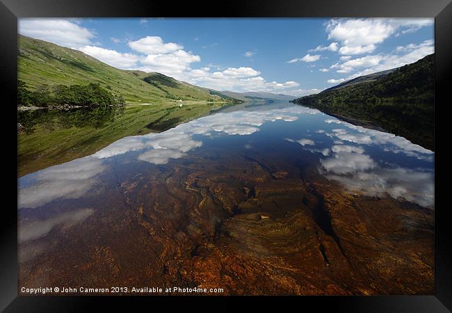 Still clear waters of Loch Arkaig. Framed Print by John Cameron