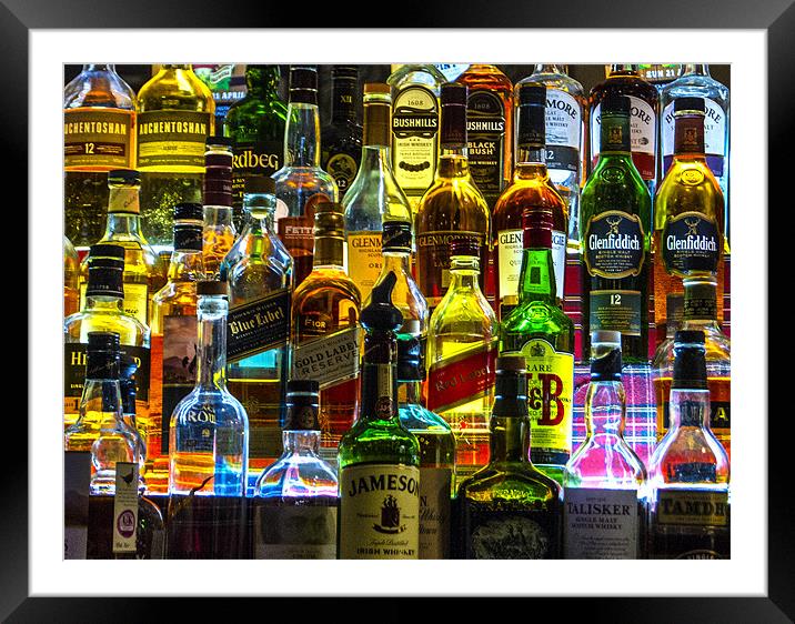 backlit bottles Framed Mounted Print by keith sutton