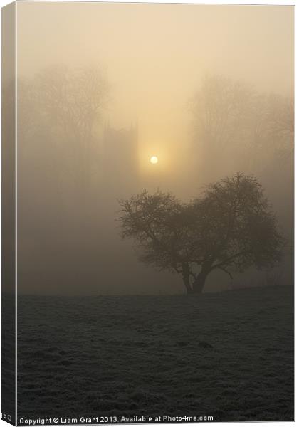 Sunrise & Fog, Hilborough Church, Norfolk Canvas Print by Liam Grant