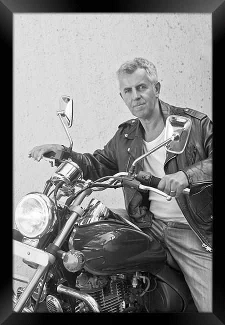 Handsome tight lipped senior motorbiker on Indian  Framed Print by Arfabita  