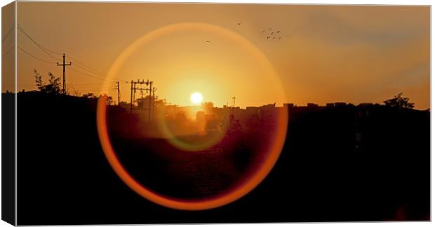 Lens flare on Okha Sunset Canvas Print by Arfabita  