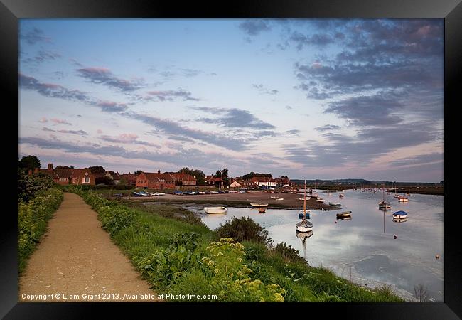 Boats and coastal path, Burnham Overy Staithe, Nor Framed Print by Liam Grant