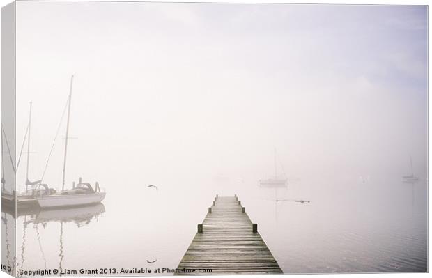Boats in fog on Lake Windermere. Waterhead, Lake D Canvas Print by Liam Grant