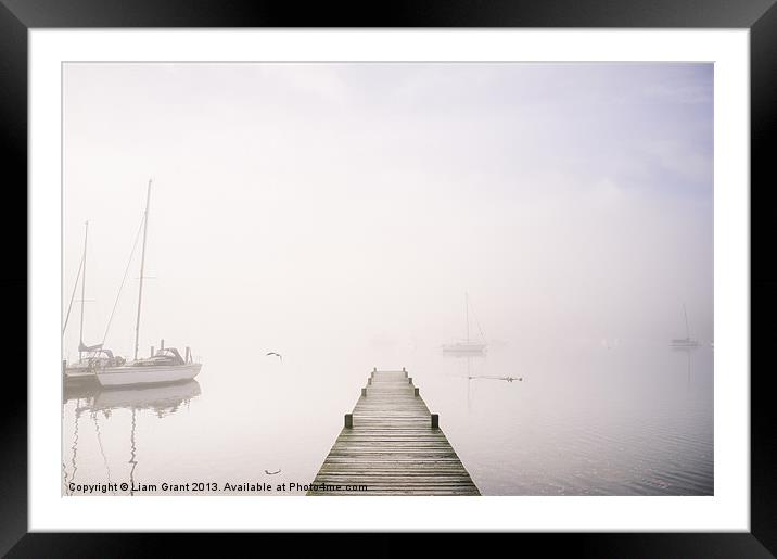 Boats in fog on Lake Windermere. Waterhead, Lake D Framed Mounted Print by Liam Grant