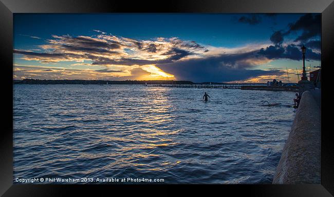Sunset Surfers Framed Print by Phil Wareham