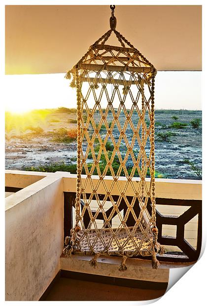 Sunrise hanging on a Rope chair Print by Arfabita  