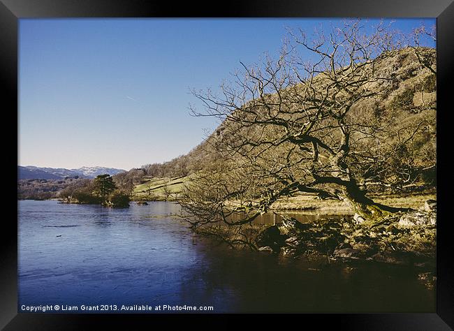Partly frozen lake. Rydal Water, Lake District, Cu Framed Print by Liam Grant
