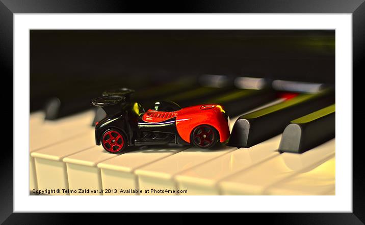 Car Toy on the Piano Framed Mounted Print by Telmo Zaldivar Jr