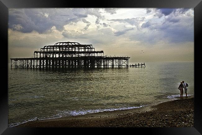 Sunset view of Brighton Pier Framed Print by Sandra Thompson