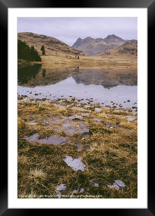Frozen Blea Tarn and Langdale Pikes. Lake District Framed Mounted Print by Liam Grant
