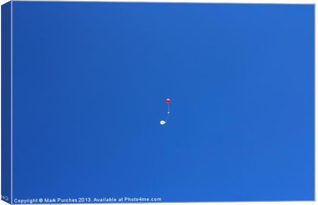 Red and White Balloons in Blue Sky Canvas Print by Mark Purches