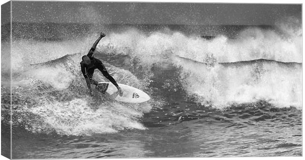 Surfing Canvas Print by Paul Want