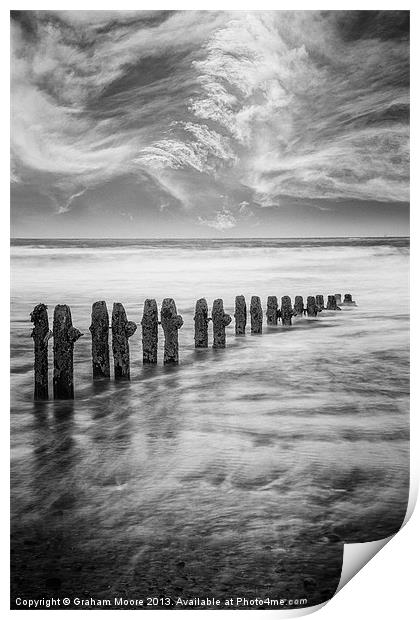Breakwater and clouds Print by Graham Moore