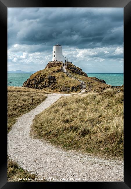 Lighthouse Path Framed Print by Adrian Evans