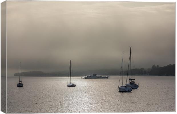 Ferry in the mist Canvas Print by Gary Finnigan