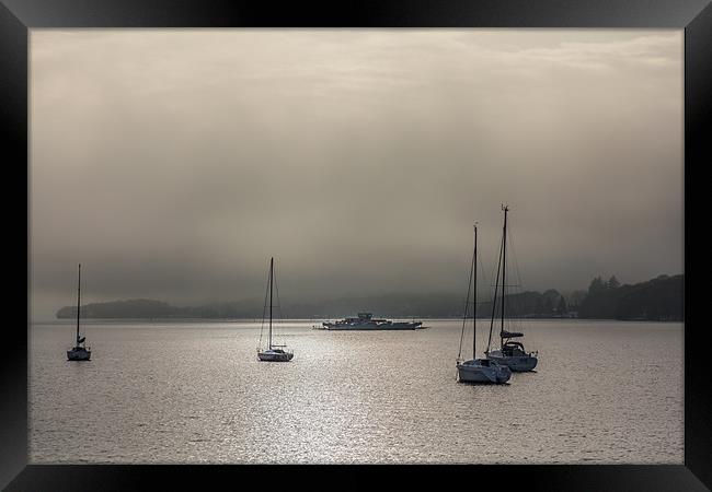 Ferry in the mist Framed Print by Gary Finnigan