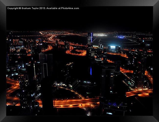 Dubais Majestic Skyline Framed Print by Graham Taylor