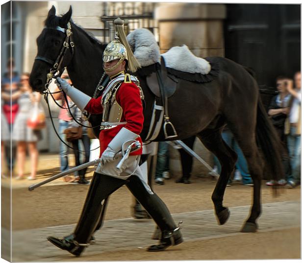 Horse and Guard Canvas Print by Dean Messenger