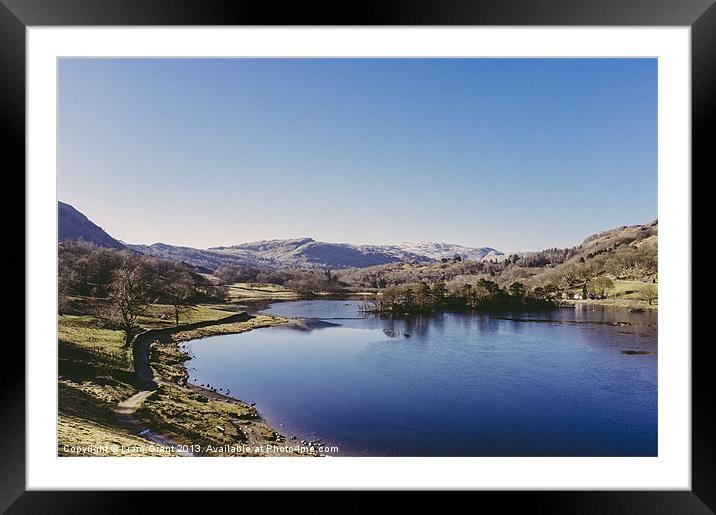 Partly frozen lake. Rydal Water. Framed Mounted Print by Liam Grant